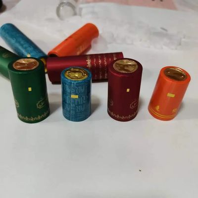 飲料包装ソリューションのためのカスタマイズされたPVCネッキングテープガラスボトル収縮キャップ