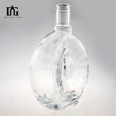 700ml ジン・ウイスキー製造用のオーダーメイドの丸い不規則な滑らかな表面のガラスボトル